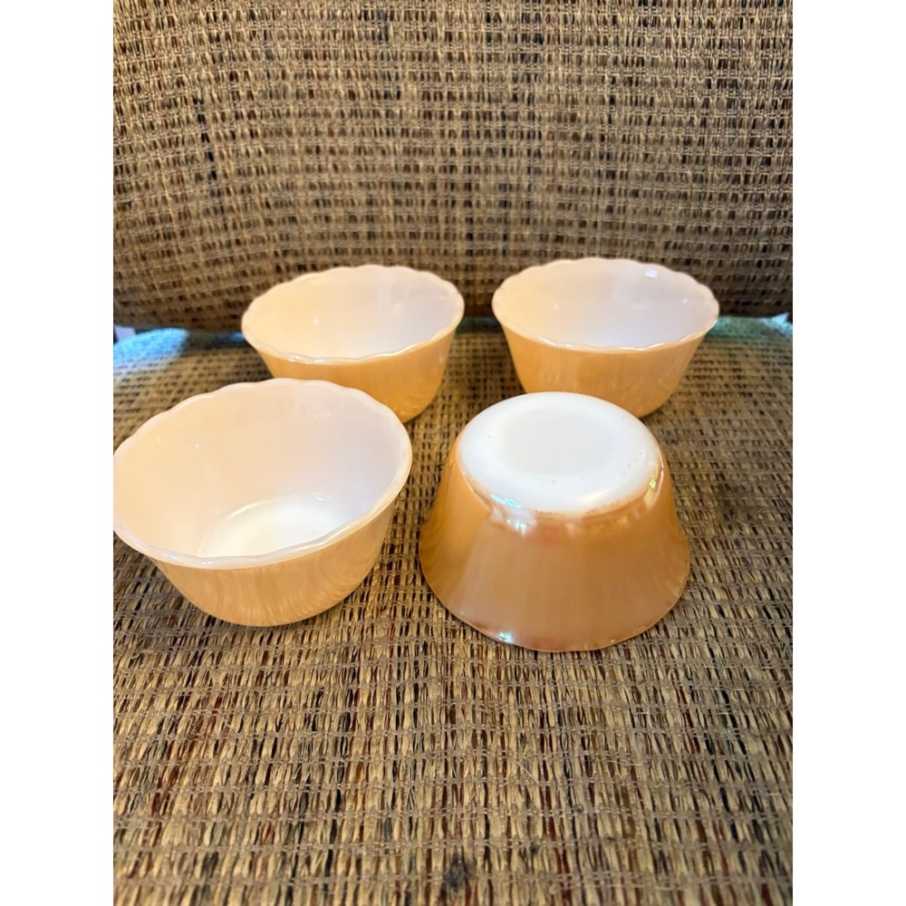 Four piece vintage fire king 6 ounce peach lustre cups